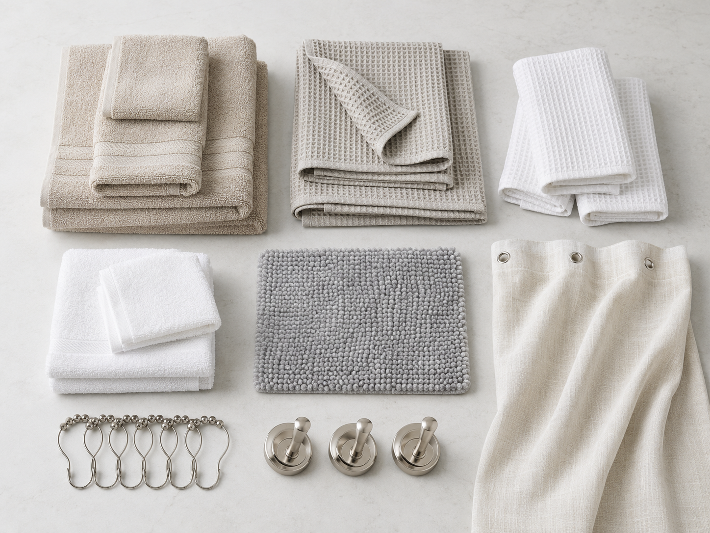 Bathroom textile moodboard showing towel, waffle, bath mat, shower curtain and hardware categories.