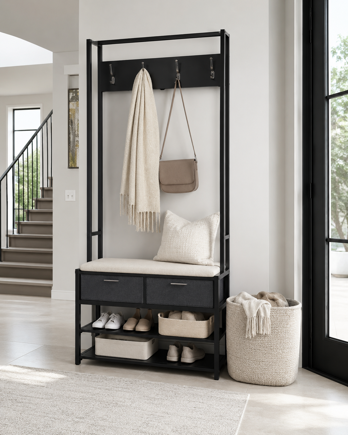 Black family entryway hall tree with storage bench, drawers, shelves, woven basket and space for shoes