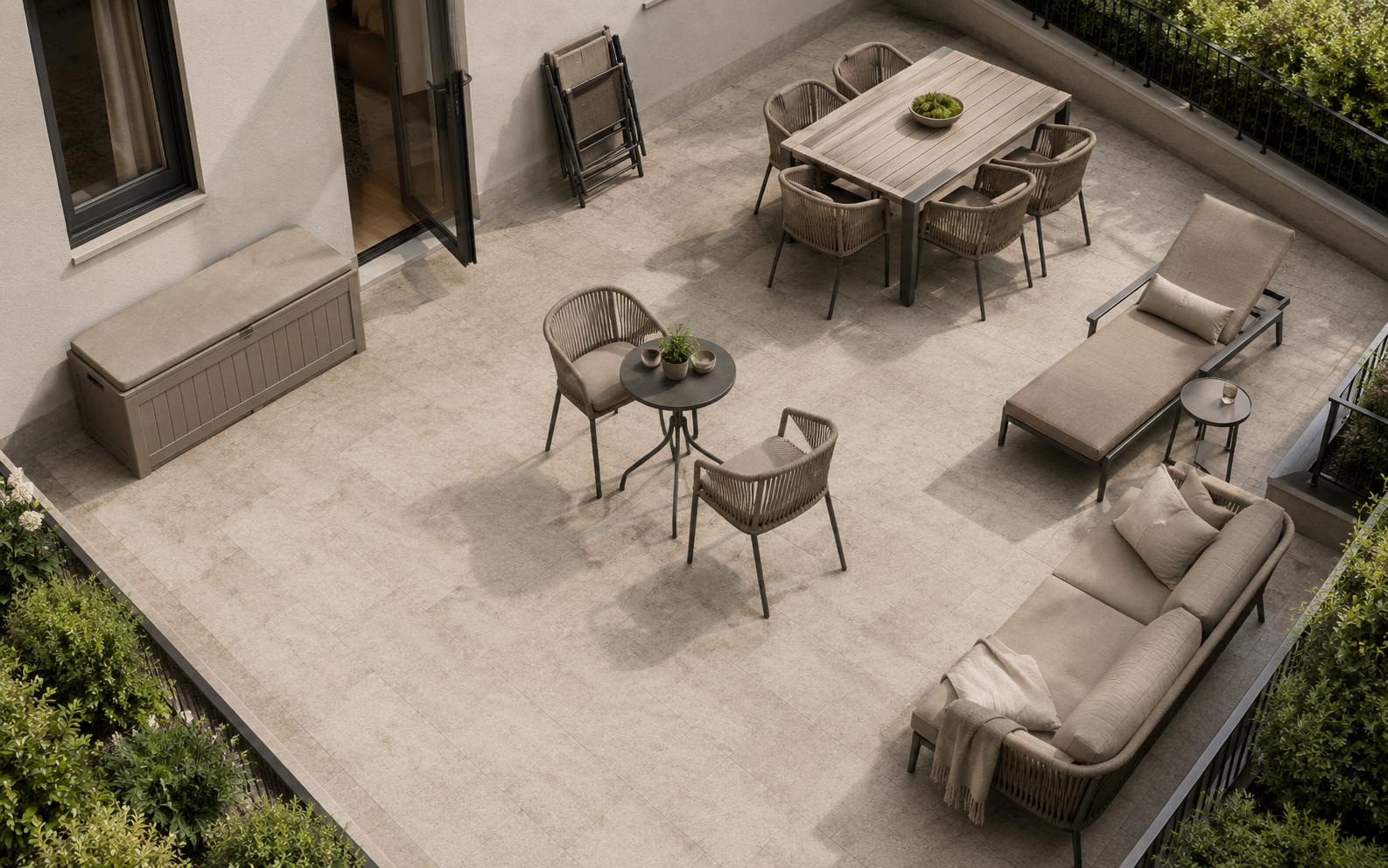 Elevated patio layout with dining furniture, bistro seating, chaise lounge, sofa, storage bench and an open circulation path