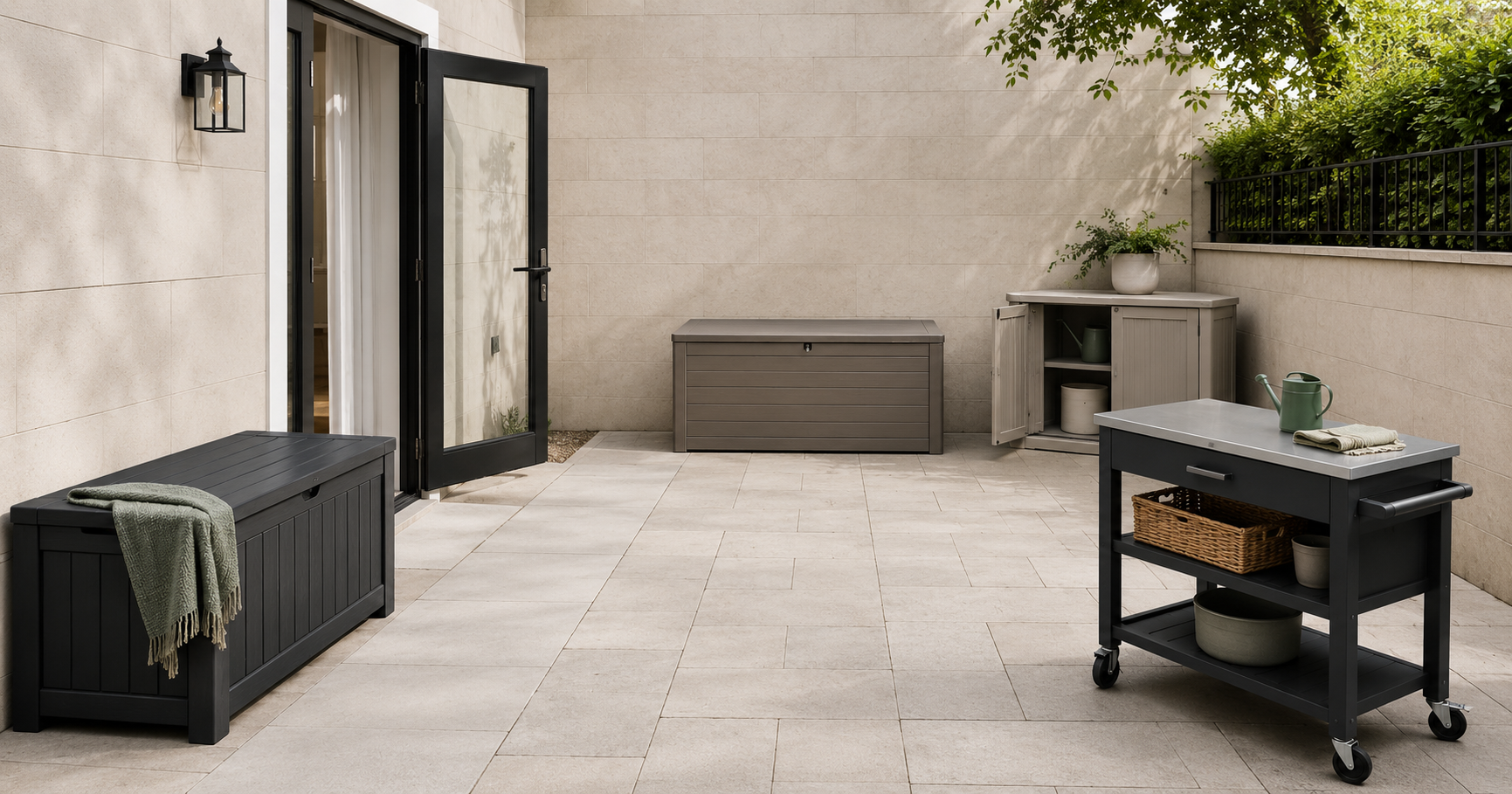 Townhouse patio with a deck box, outdoor cabinet, storage bench and mobile preparation cart positioned around an open walkway.