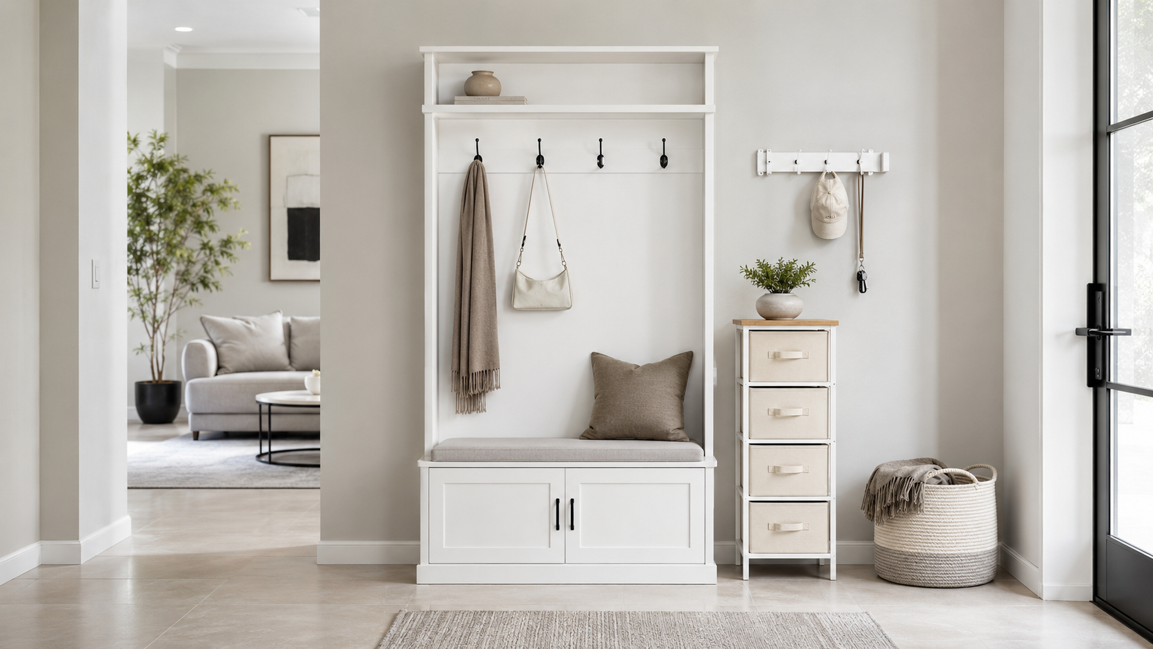 White hall tree with bench, wall-mounted hooks, narrow drawer cabinet and woven basket for entryway storage
