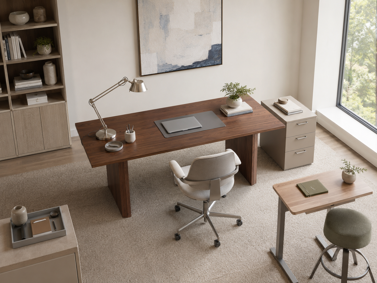 Small home office solution with a slim desk, compact chair and vertical shelving