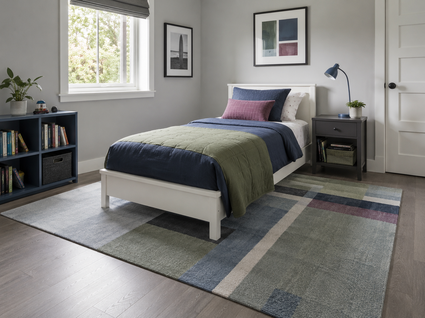 Kids bedroom with a large rug visually anchoring the bed and surrounding sleep-zone furniture