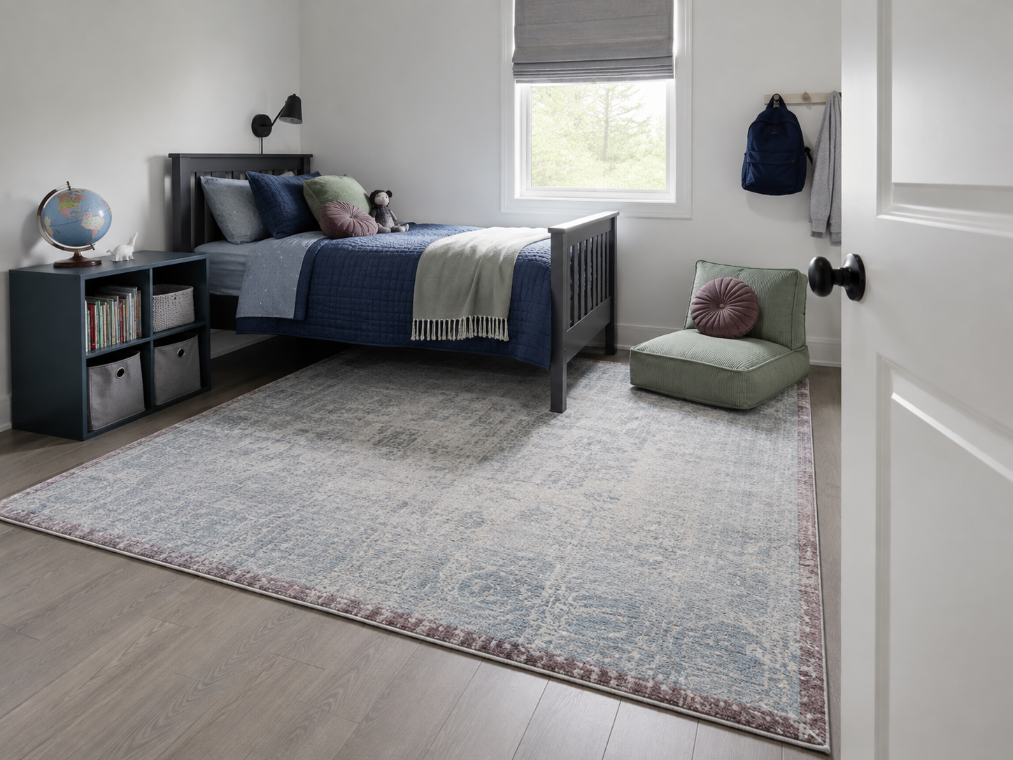 Contemporary kids bedroom showing one correctly proportioned rug relating to the bed, open floor and door clearance