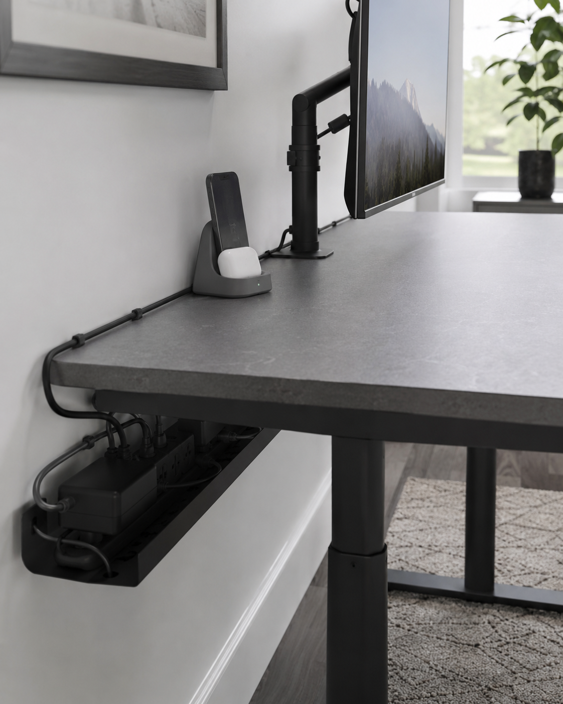 Home Office Desk Accessories - Ravnora Decor Contemporary desk with controlled rear-edge cables, under-desk cable handling and a defined device charging point.