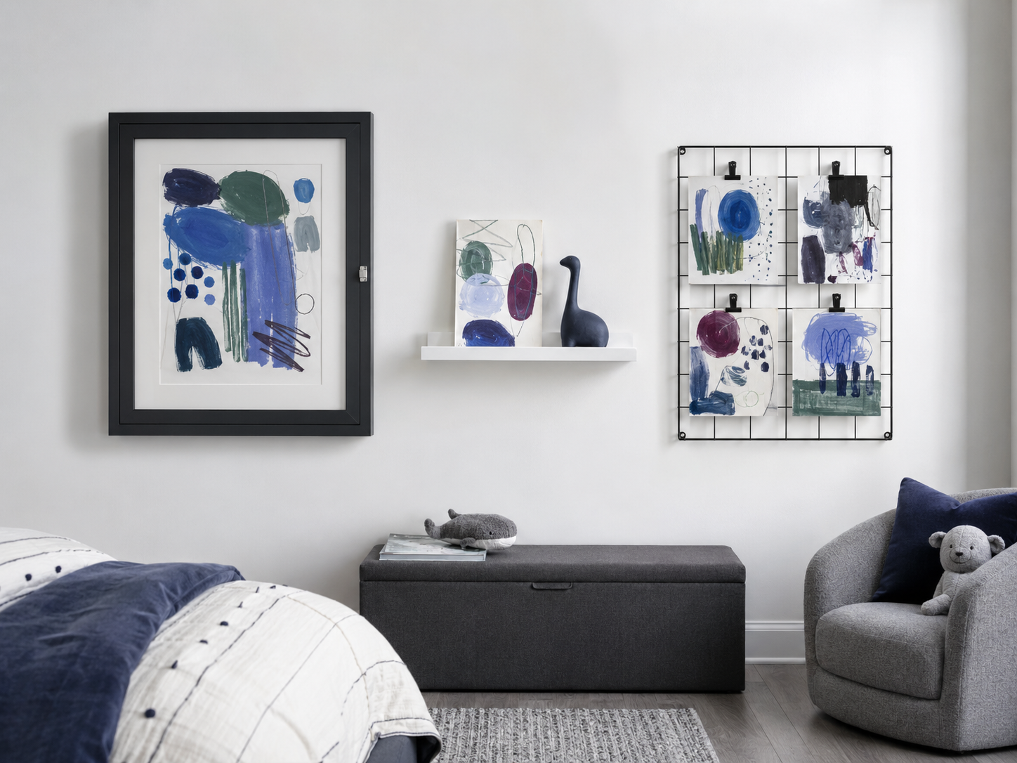 Changeable kids wall with an artwork frame, picture ledge and modular grid for rotating creations.