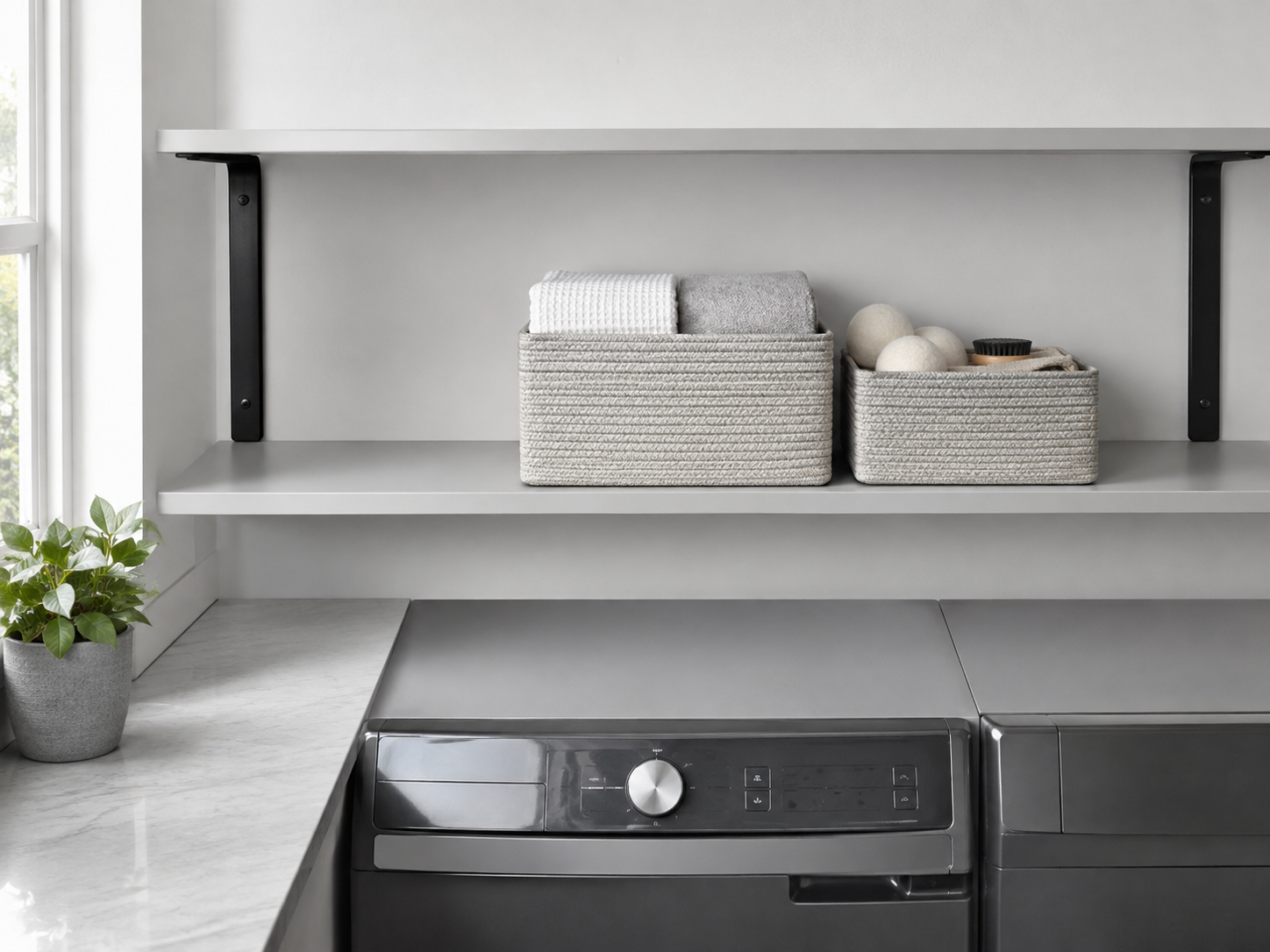 Open laundry shelf with restrained woven baskets and substantial clear space around them.