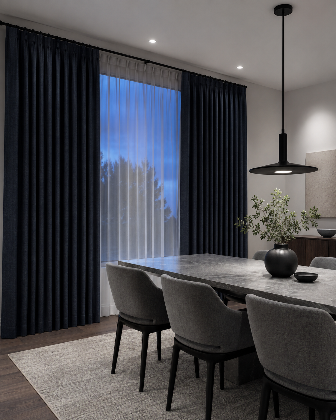 Cool-toned modern dining room with deep curtains and inner sheers for evening privacy