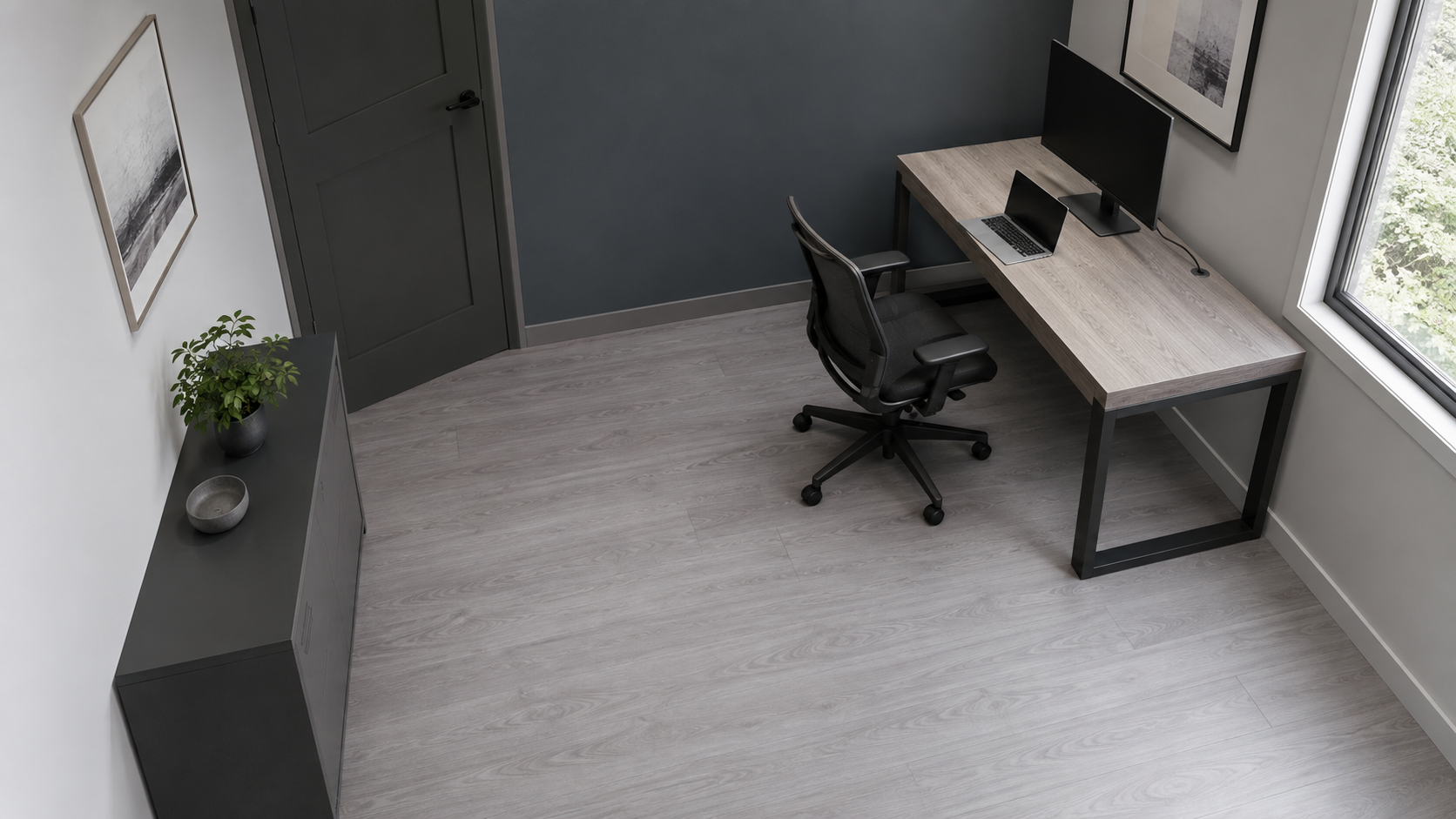 Elevated home office showing the desk surface, chair movement and circulation around the workstation.