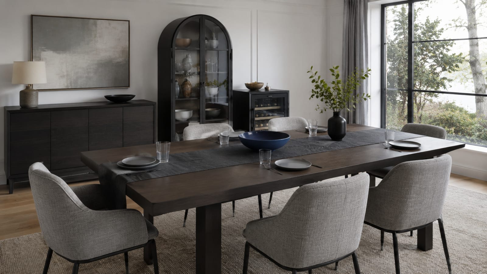 Dining Table Decor - Ravnora Decor Contemporary dining table styled with a restrained low centerpiece and generous usable surface