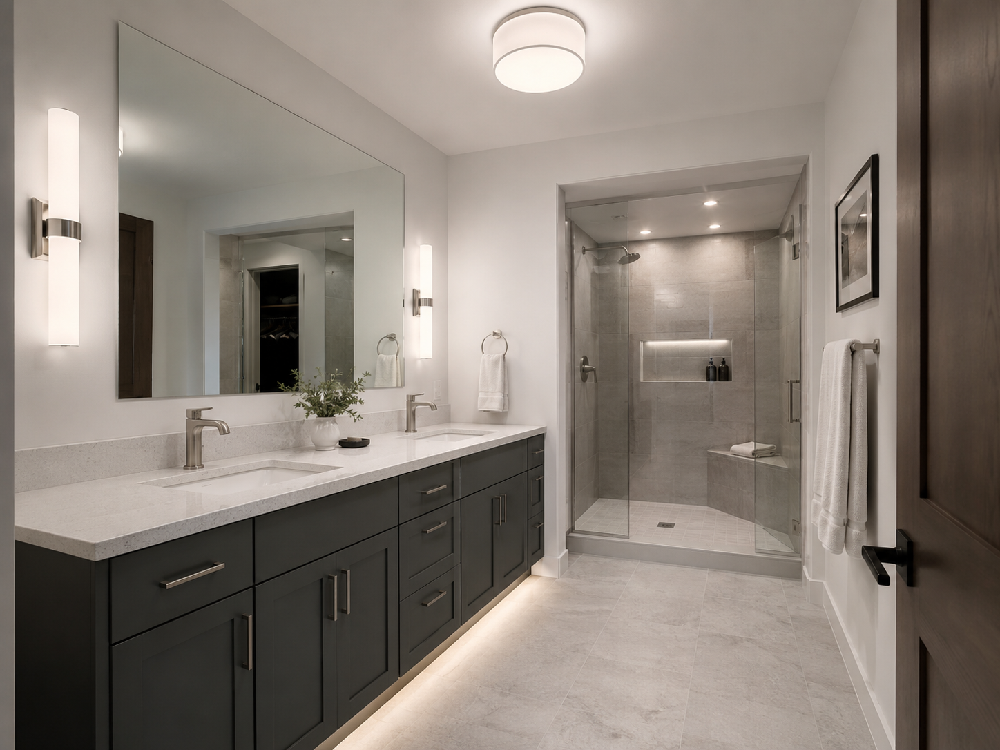 Contemporary bathroom using layered vanity, ceiling, shower and low-level lighting