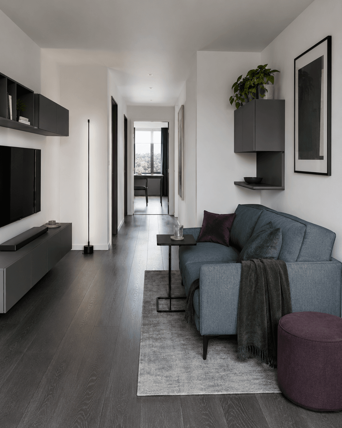 Pass-through small living room with seating positioned beside the walking route.