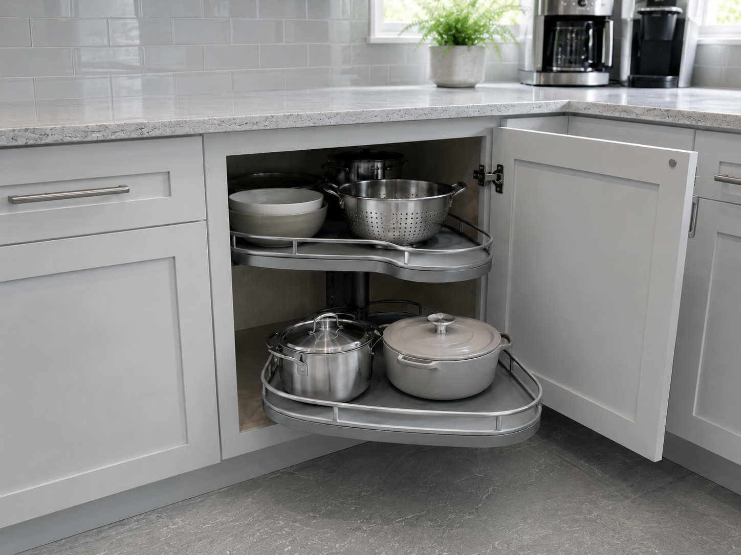 Kitchen Cabinet Organization - Ravnora Decor Corner kitchen cabinet using a rotating pull-forward organizer to bring difficult-to-reach items toward the opening.