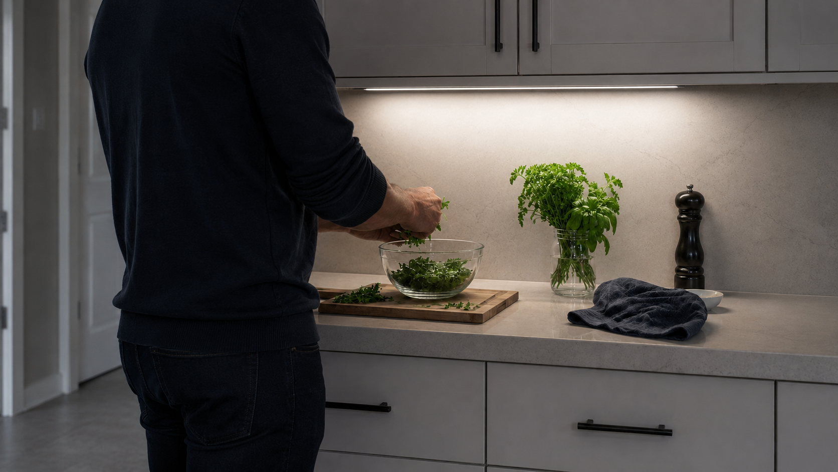 Editorial comparison of hardwired, plug-in and rechargeable kitchen lighting power routes.