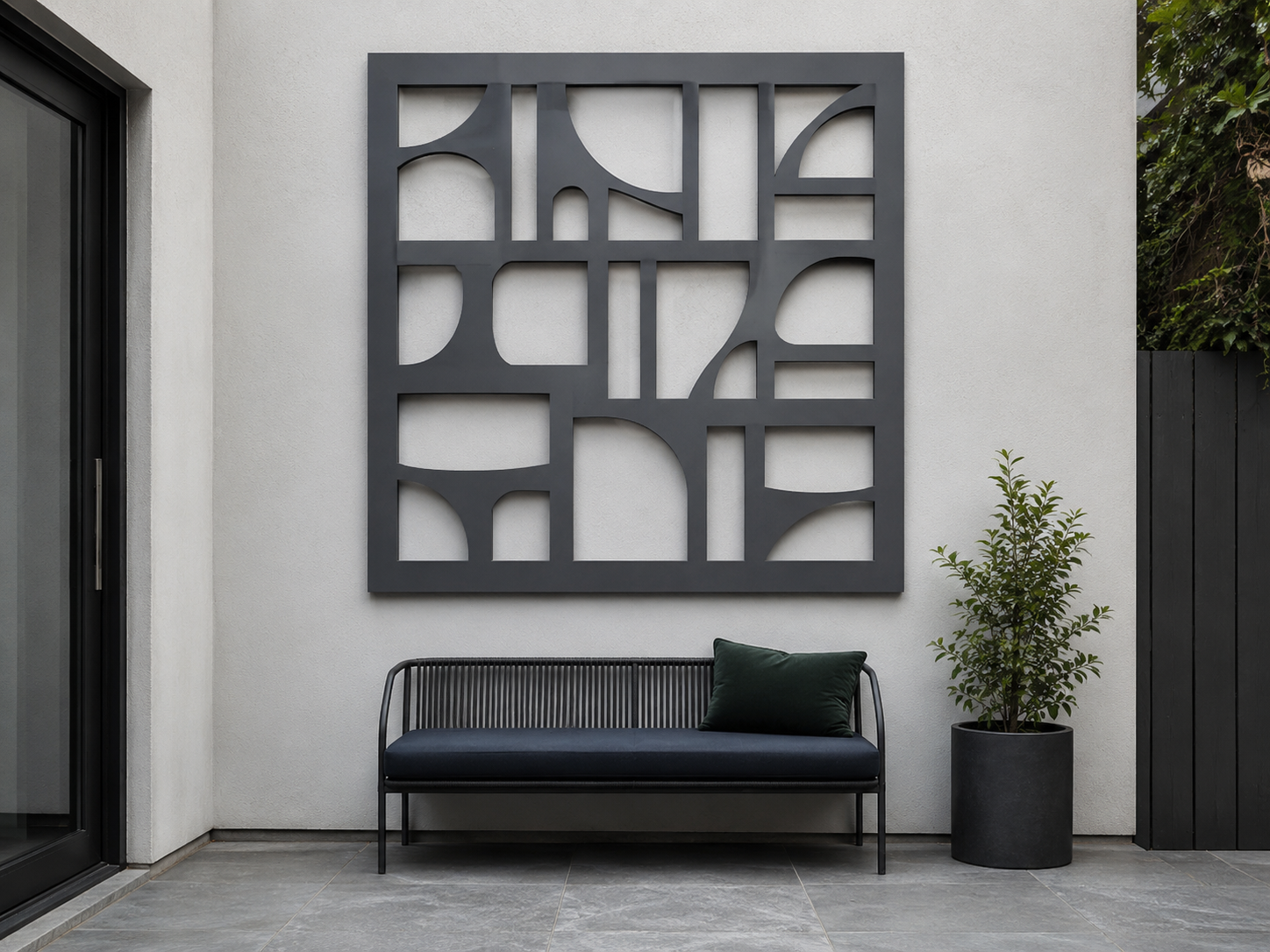 Quiet contemporary patio wall using a restrained architectural panel with generous negative space.