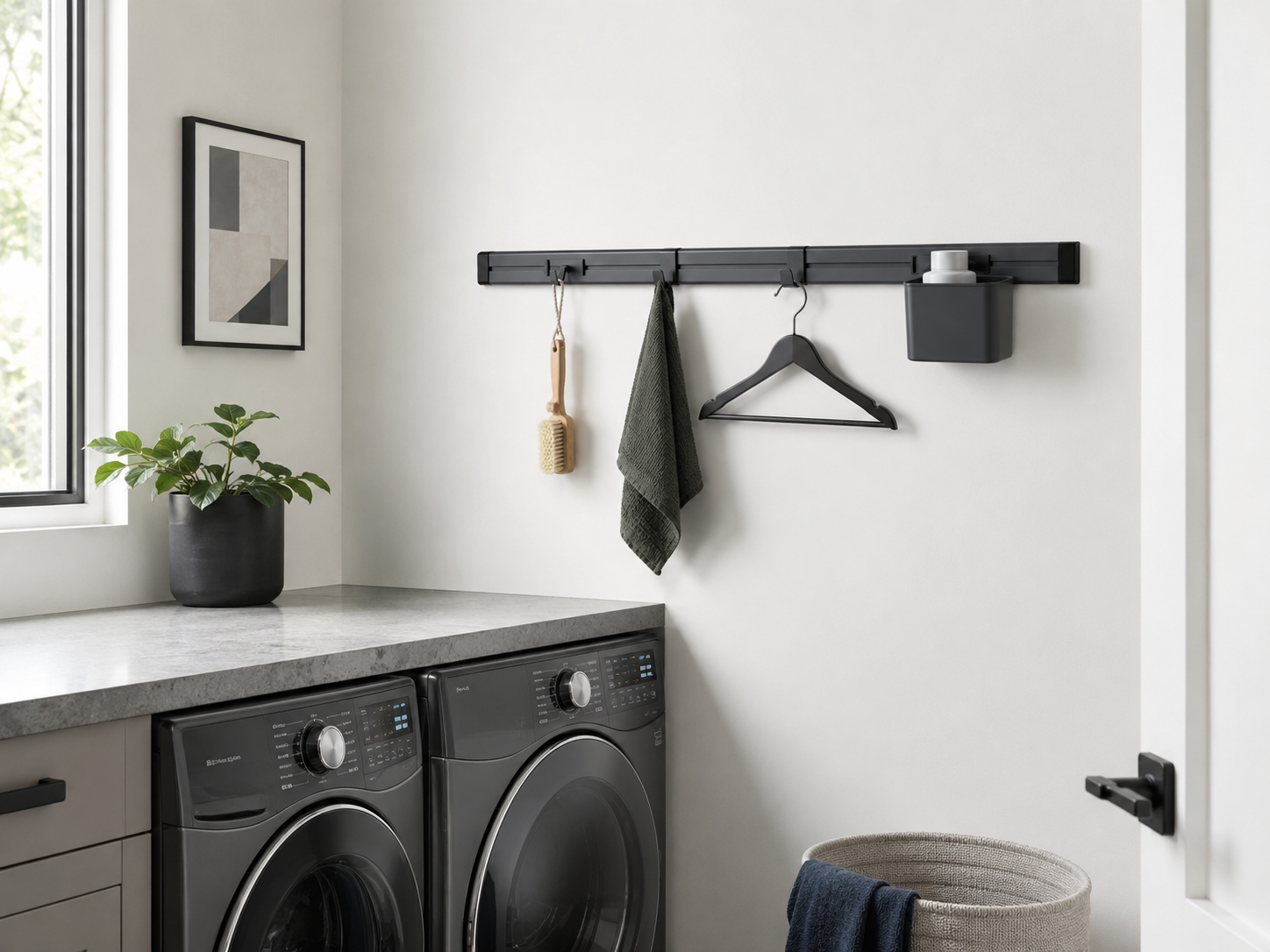 Laundry Wall Organization - Ravnora Decor Laundry utility rail organizing several lightweight functions within one clear horizontal wall zone.