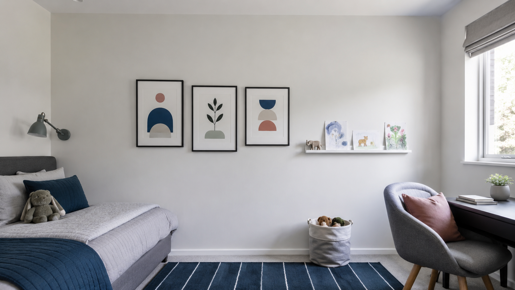 Contemporary cool-toned kids bedroom with framed artwork and a flexible wall display.