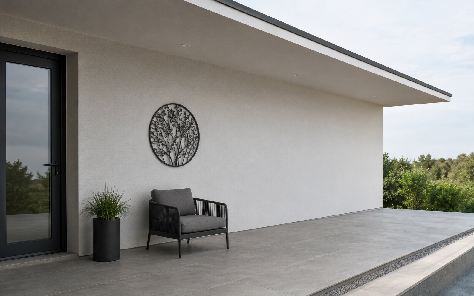 Contemporary patio wall showing a protected covered area and a more exposed open edge for scale and placement decisions.