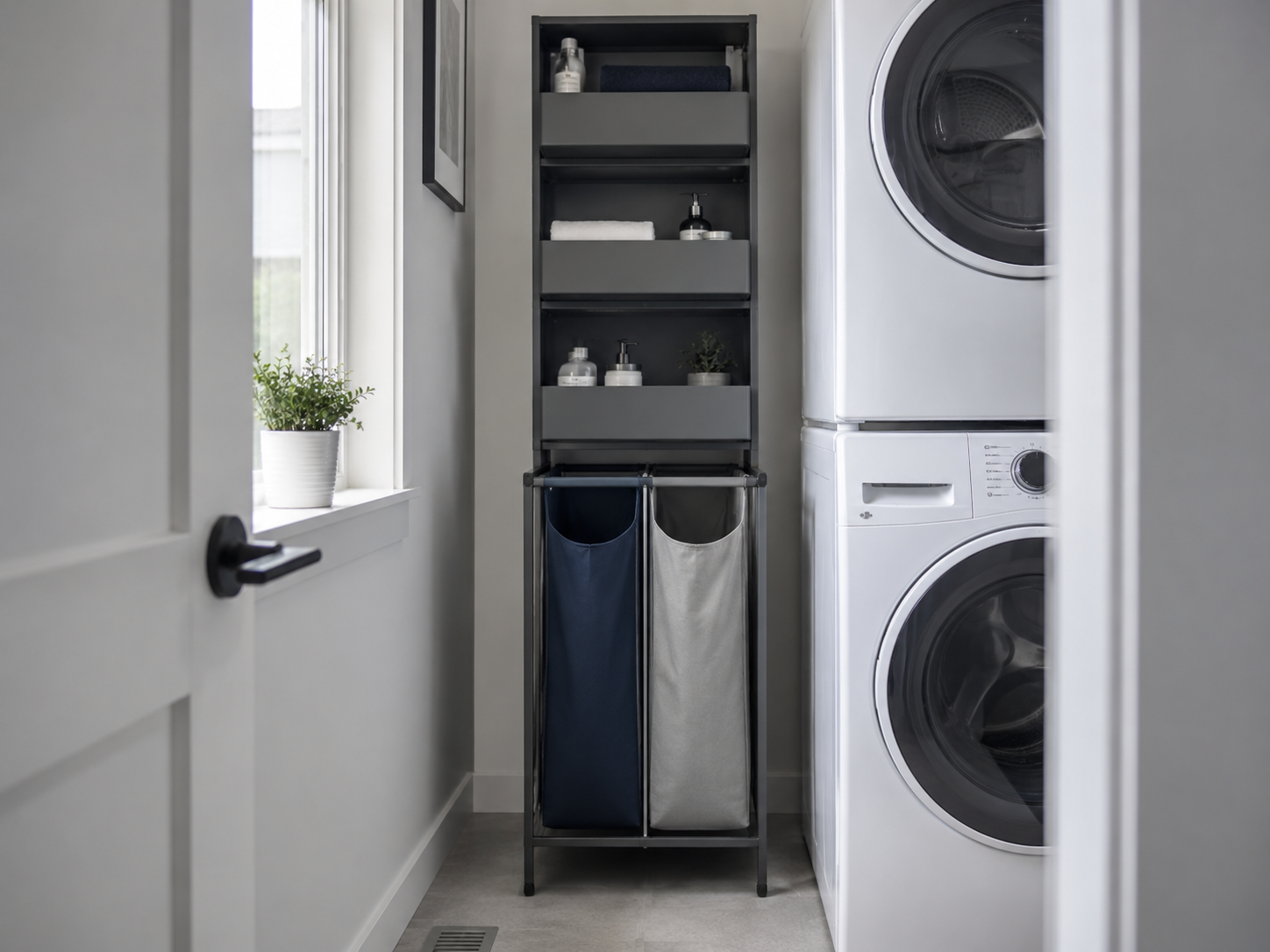 Small Laundry Room Solutions - Ravnora Decor Vertical divided laundry sorter and stacked storage beside compact stacked laundry appliances.