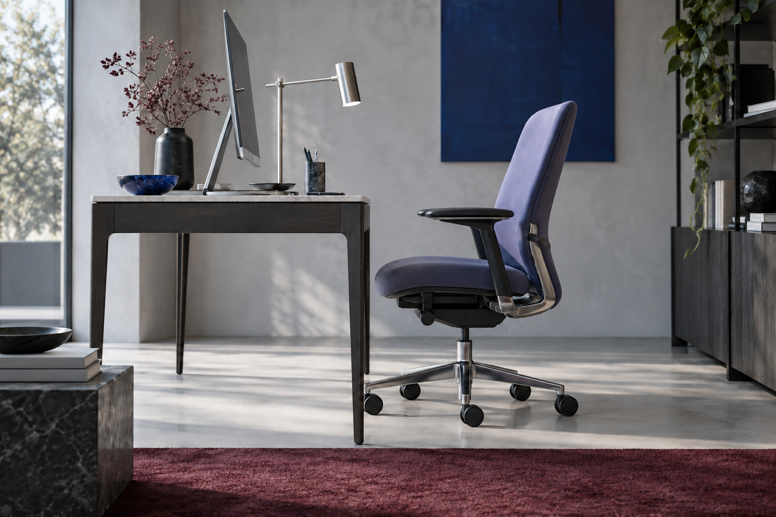 Home office showing a desk and ergonomic chair with clear pull-back room, desk clearance and working depth.