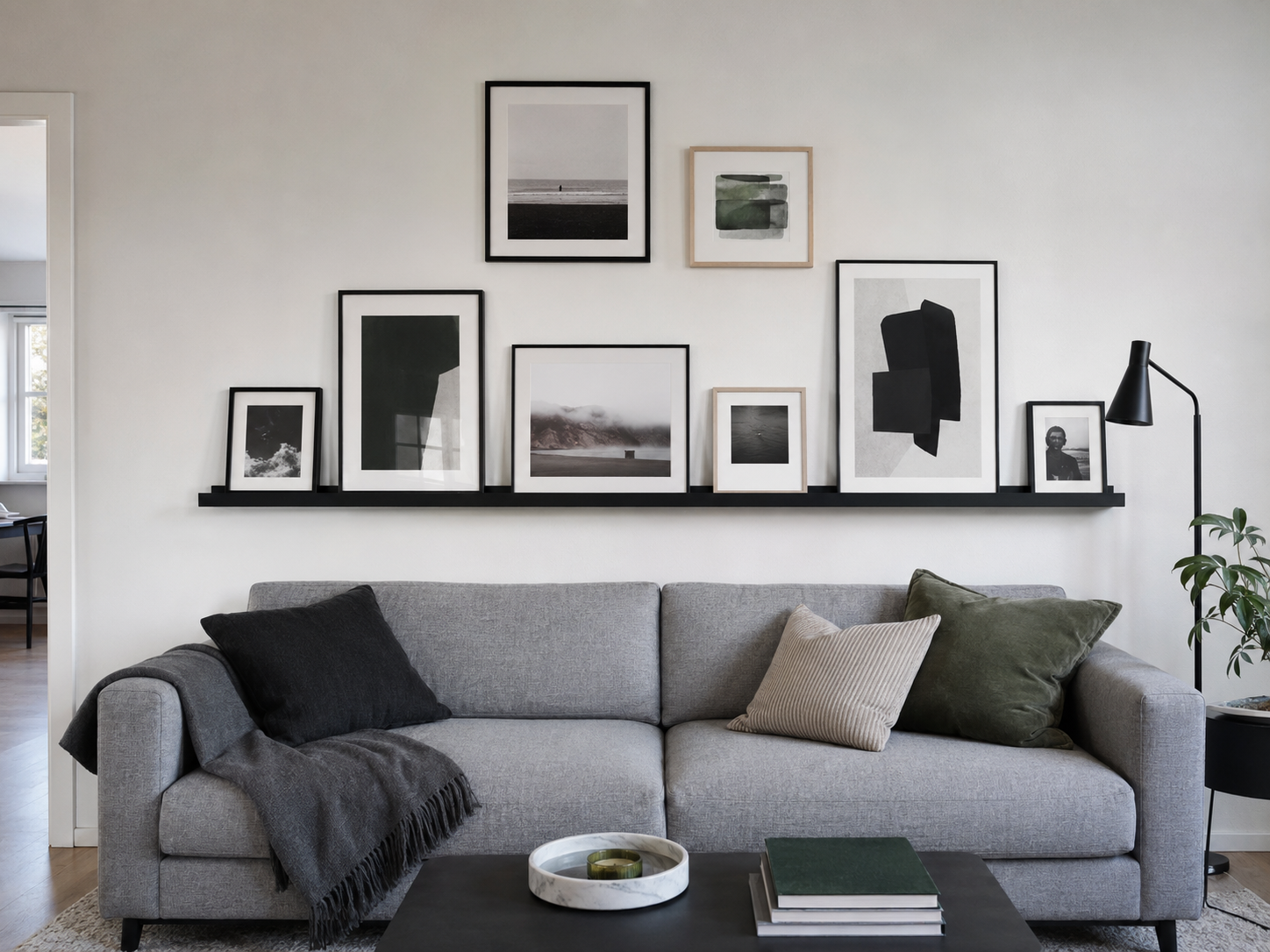 Living Room Wall Decor - Ravnora Decor Gallery wall and picture ledge above a living room sofa