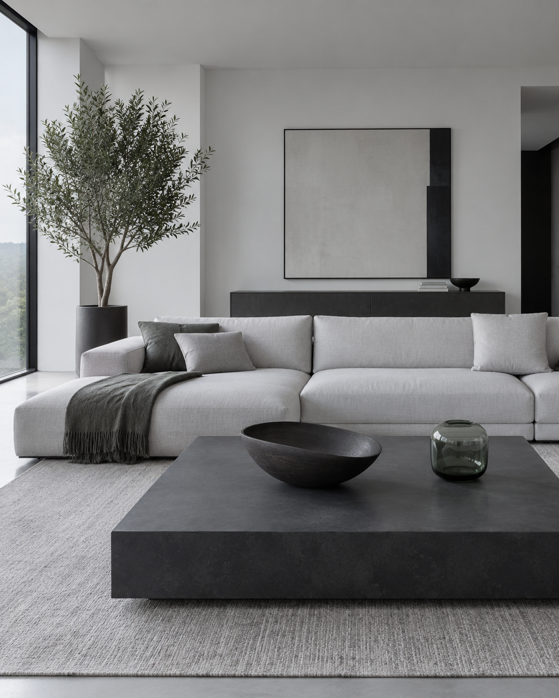 Living Room Decorative Accessories - Ravnora Decor Restrained contemporary living room finished with greenery, one sculptural object and intentional negative space.