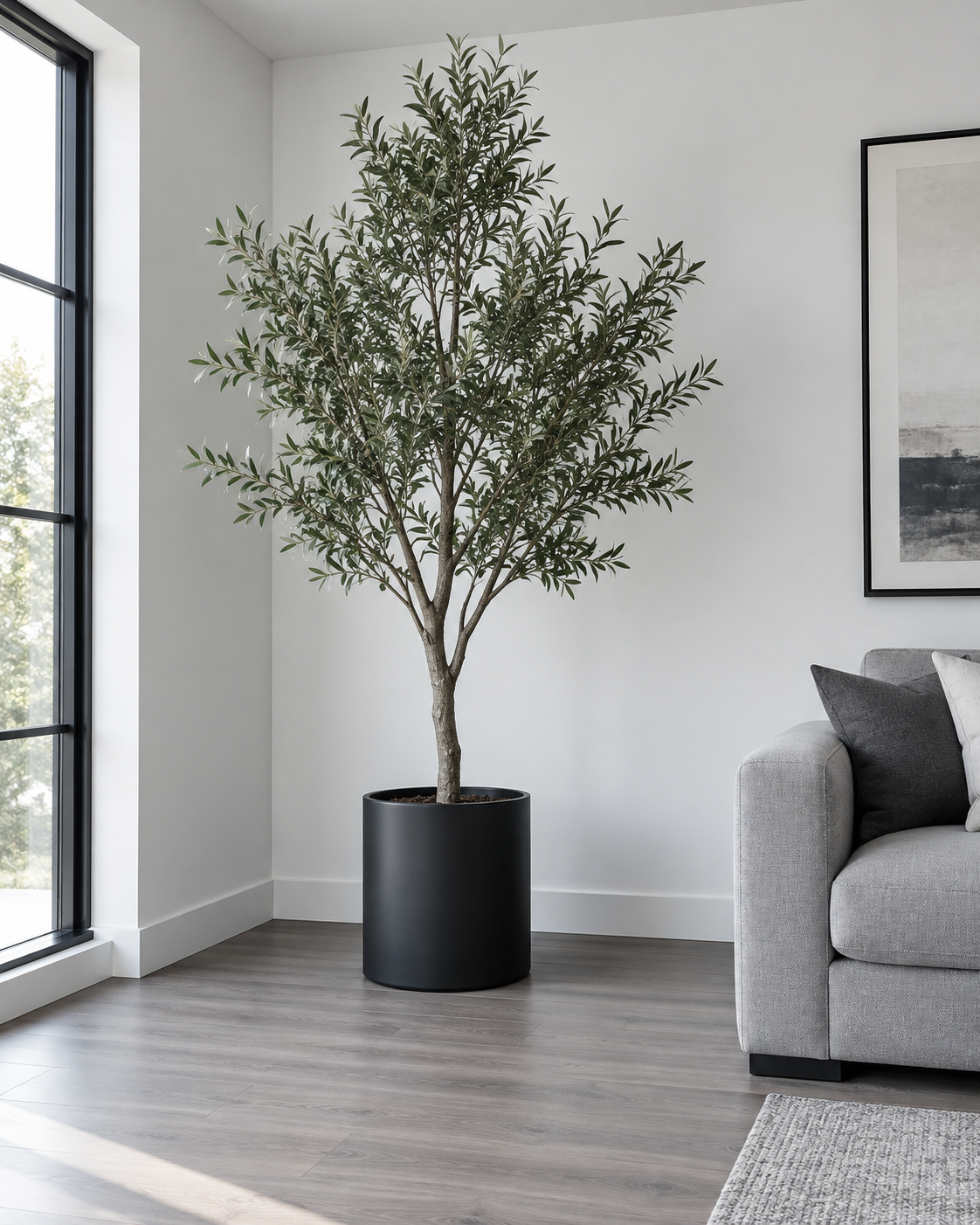 Living Room Decorative Accessories - Ravnora Decor Living-room corner finished with one tall green floor anchor and clear breathing room.