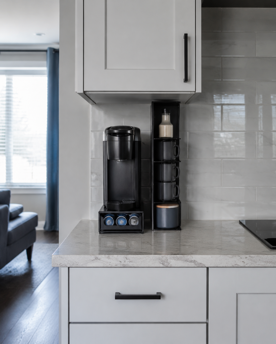 Compact coffee station using vertical storage on a narrow apartment kitchen counter.