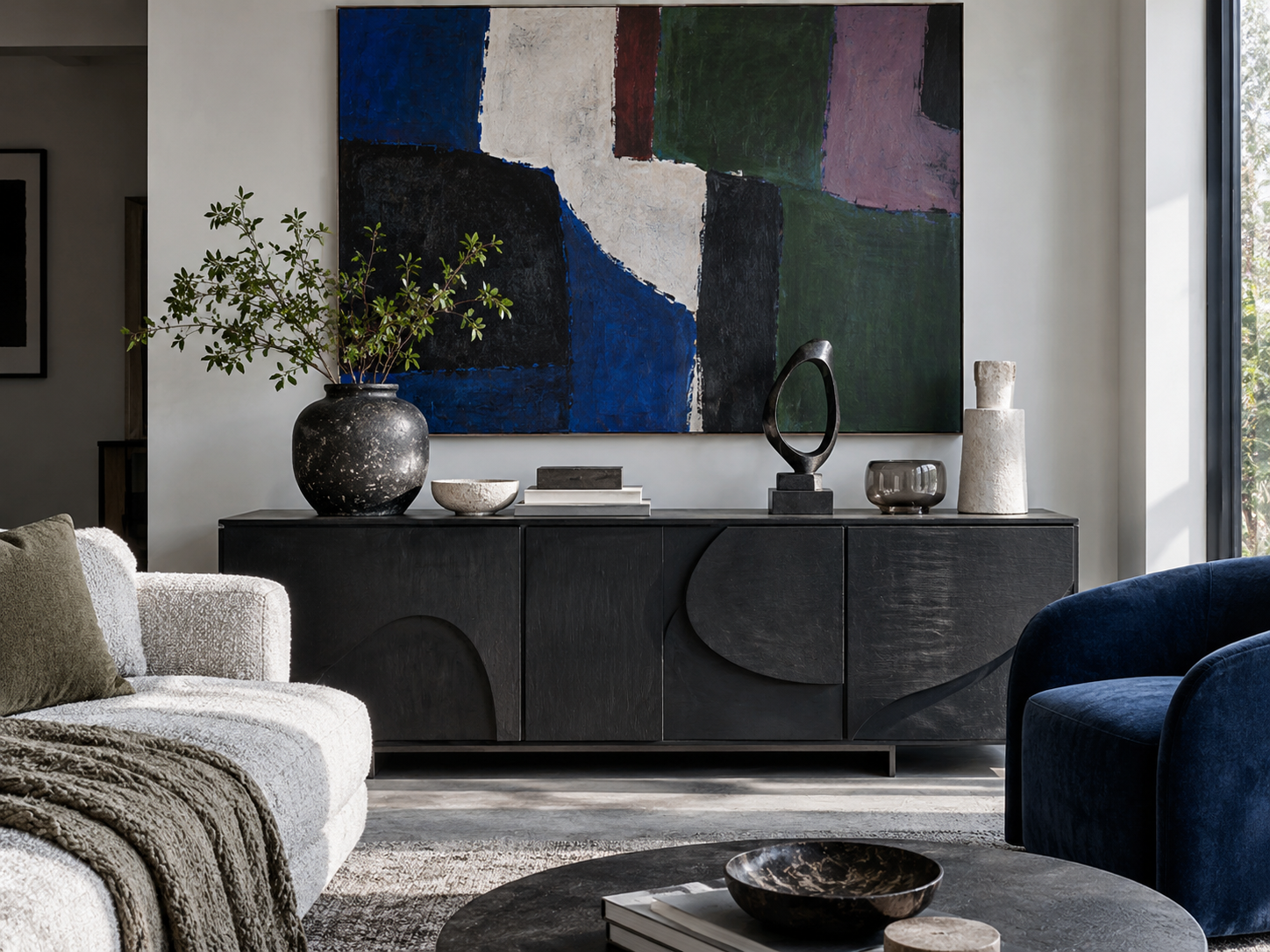 Living Room Decor Ideas - Ravnora Decor Contemporary living room with expressive artwork and richly layered decorative styling.